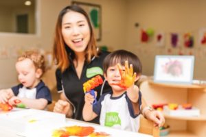 A preschool teacher with children